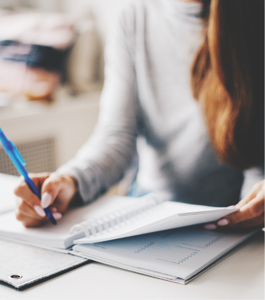 girl writing down notes